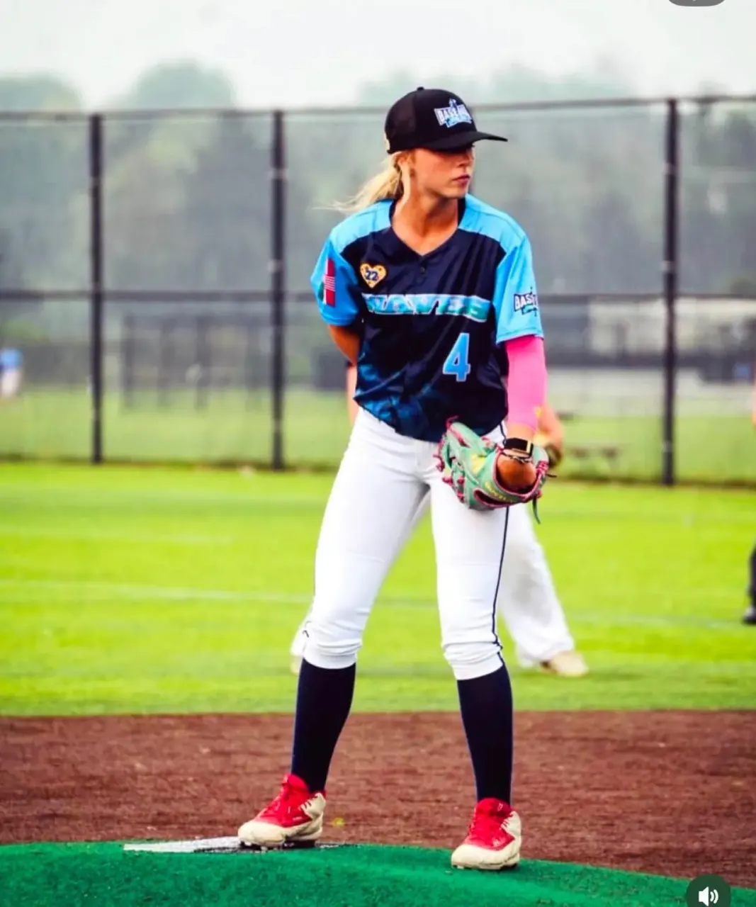 Finleigh Kane standing on the mound in a California Waves jersey, number 4