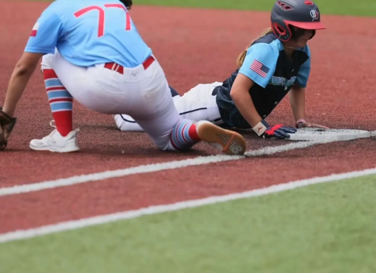 Finleigh Kane sliding into a base for the California Waves